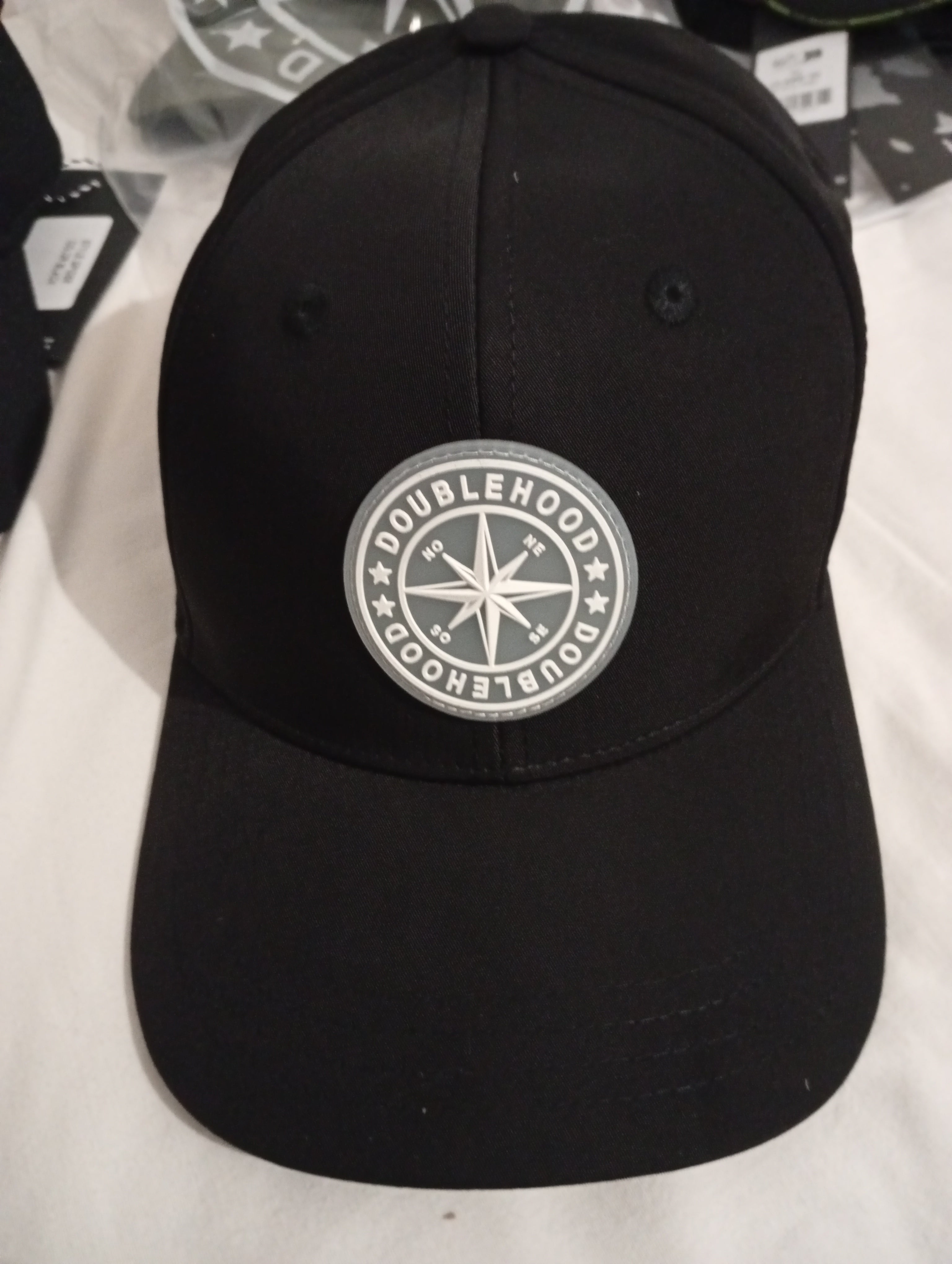 Double-hooded Bucci cap